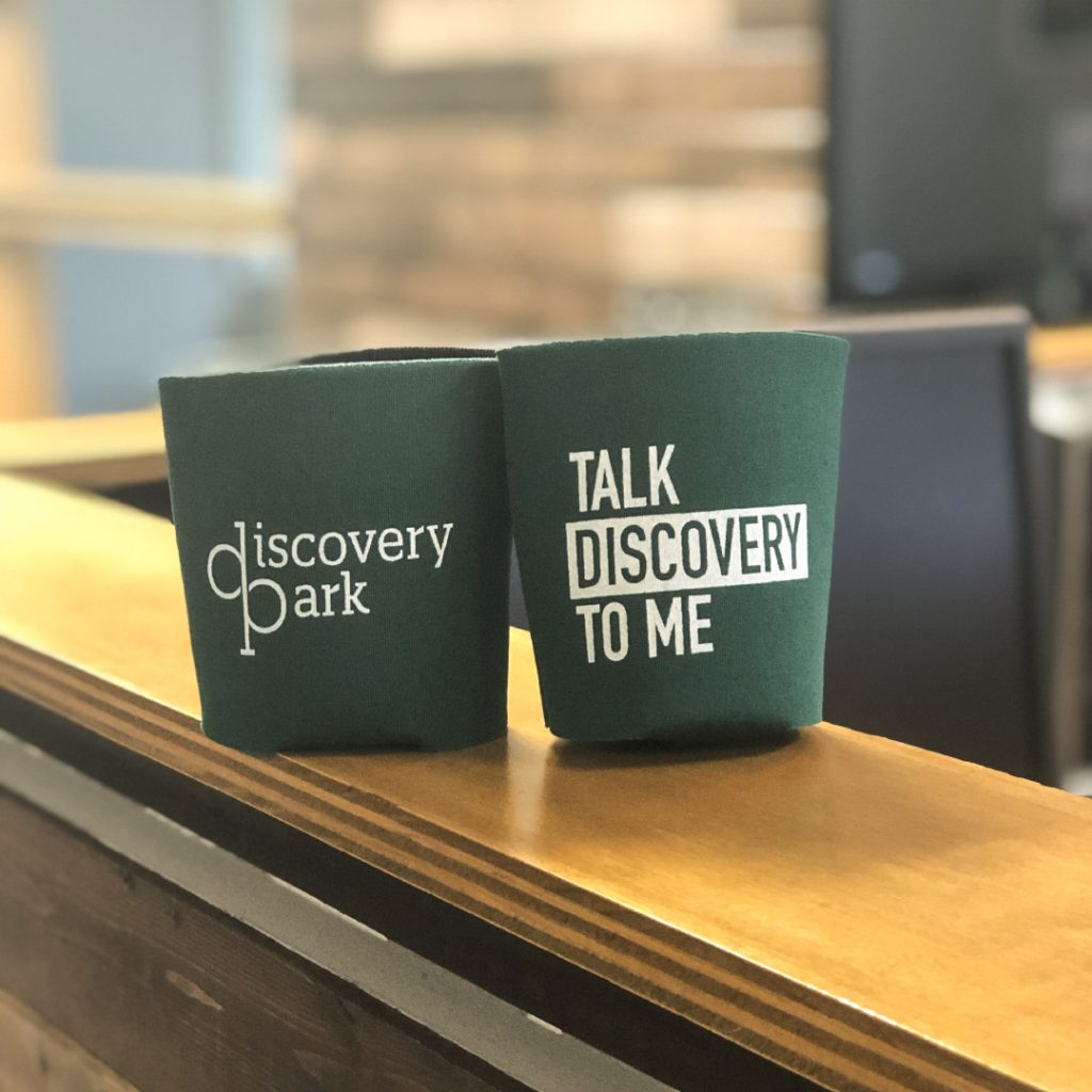 Promotional mugs with Discovery Park logo on it.